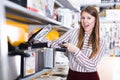 delighted young woman with purchase