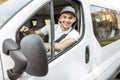 Portrait of delivery driver in the car Royalty Free Stock Photo