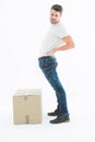 Portrait of delivery man suffering from back ache Royalty Free Stock Photo