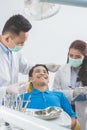 Dentist checking patient teeth Royalty Free Stock Photo