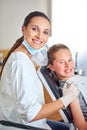 Portrait, dentist and woman with tools for happy kid in medical exam, orthodontics or cleaning teeth. Face, smile and Royalty Free Stock Photo