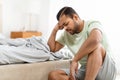 Portrait Of Depressed Young Black Man Sitting On Floor Royalty Free Stock Photo