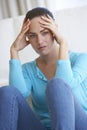 Portrait Of Depressed Young Woman At Home Royalty Free Stock Photo