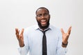 Portrait of desperate annoyed black male screaming in rage and anger tearing his hair out while feeling furious and mad Royalty Free Stock Photo