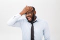 Portrait of desperate annoyed black male screaming in rage and anger tearing his hair out while feeling furious and mad Royalty Free Stock Photo