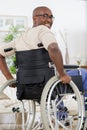 portrait disabled man in wheelchair at home Royalty Free Stock Photo