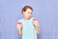 Portrait of disgusted girl with white spots of cosmetic on face Royalty Free Stock Photo