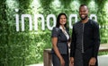 Portrait of a diverse group of diverse African businesspeople smiling while standing together in an eco-friendly modern office