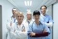 Medical teams standing with arms crossed in the corridor at hospital Royalty Free Stock Photo