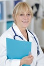 portrait doctor holding clipboard Royalty Free Stock Photo