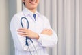 Portrait doctor man smiling crossed arm hold stethoscope Royalty Free Stock Photo