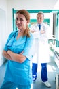 Portrait of doctor and nurse standing with arms crossed Royalty Free Stock Photo