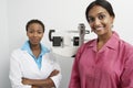 Portrait of Doctor And Patient With Scales In Background Royalty Free Stock Photo