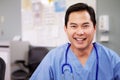 Portrait Of Doctor Working At Nurses Station Royalty Free Stock Photo