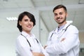 Portrait of doctors in coats at workplace Royalty Free Stock Photo