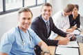 Portrait of doctors smiling in conference room Royalty Free Stock Photo