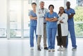 Portrait, doctors and team of nurses with arms crossed standing together in hospital. Face, confident and medical Royalty Free Stock Photo