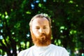 Portrait of doubtful thoughtful mature man with red hair Royalty Free Stock Photo