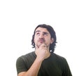 Portrait of doubtful young man, keeps hand under chin, thoughtful gesture, looking up suspicious isolated on white background with Royalty Free Stock Photo