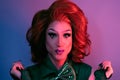 Portrait of drag queen on colored background looking in the camera Royalty Free Stock Photo
