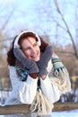 Portrait of dreaming girl in winter park outdoors Royalty Free Stock Photo