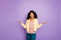 Portrait of dreamy interested minded afro american girl hold hand weighing object think thoughts choice decision Royalty Free Stock Photo