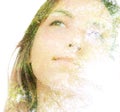 A half disappearing double exposure portrait of a dreamy young woman looking away from the camera Royalty Free Stock Photo