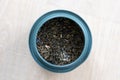 A portrait of dried loose fresh marrakech mint tea in a blue can. Ready to be used to make a delicious fresh cup of the warm Royalty Free Stock Photo