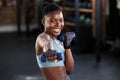 Portrait, dumbbell or happy black woman boxing in training, exercise or workout for a strong punch or power. Smile, face Royalty Free Stock Photo
