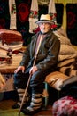 Portrait of an elder man in traditional old home and traditional clothes, Roumania Maramures County