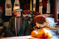 Portrait of an elder man in traditional old home and traditional clothes, Roumania Maramures County