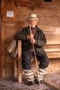 Portrait of an elder man in traditional old home and traditional clothes, Roumania Maramures County