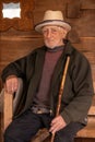 Portrait of an elder man in traditional old home and traditional clothes, Roumania Maramures County