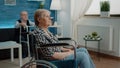 Portrait of elder woman with disability at nursing home