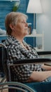 Portrait of elder woman with disability at nursing home