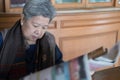 Portrait of elder woman, elderly female, senior read newspaper.