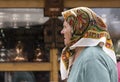 Portrait of an elder woman walking in the street of sarajevo