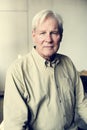 Portrait of elderly caucasian man with thoughtful face expression