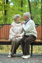 Portrait of elderly couple in autumn park Royalty Free Stock Photo