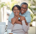 Portrait of elderly couple hug and bonding, happy and enjoying tea break at home together. Retirement, love and smiling Royalty Free Stock Photo