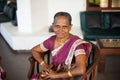 Portrait of an elderly Indian happy woman in a festive national Sari