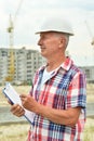 Portrait of an elderly man on a construction site Royalty Free Stock Photo