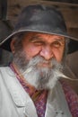 Portrait of Elderly Man with Handlebar Mustache