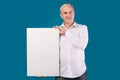 Portrait of elderly man holding blank placard Royalty Free Stock Photo