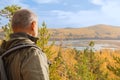 Portrait of an elderly man. Travels on vacation in the Mountains