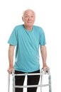 Portrait of elderly man using walking frame isolated Royalty Free Stock Photo