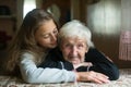 Portrait of elderly woman grandmother with her little girl granddaughter Royalty Free Stock Photo