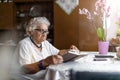 Portrait of an elderly woman at her home Royalty Free Stock Photo