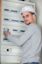 Portrait electrician at electrical box