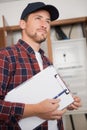 portrait electrician standing next to fuseboard Royalty Free Stock Photo